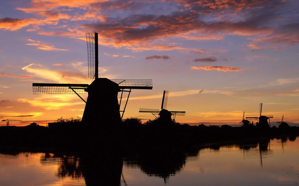 WindmillsReflectedKinderdijkNetherl.jpg